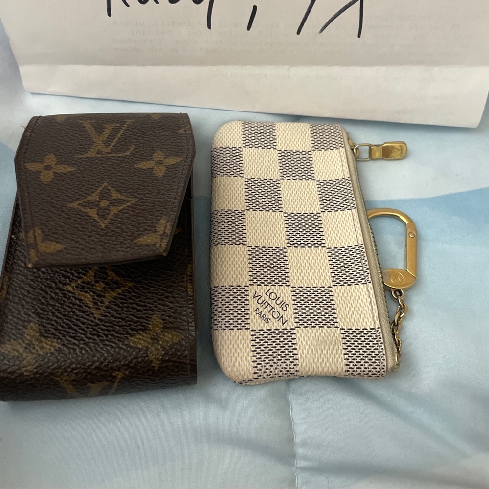LV Key cles and cigarette cles,